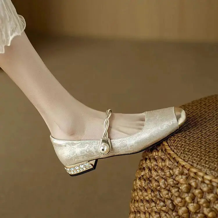 Vela Pearl Pumps